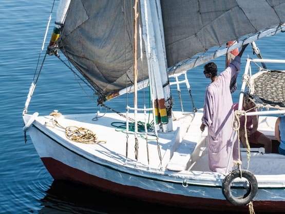 Felucca boat excursion river nile aswan egypt to elephantine island botantical gardens taken by debbie allen glad rags and cabin bags